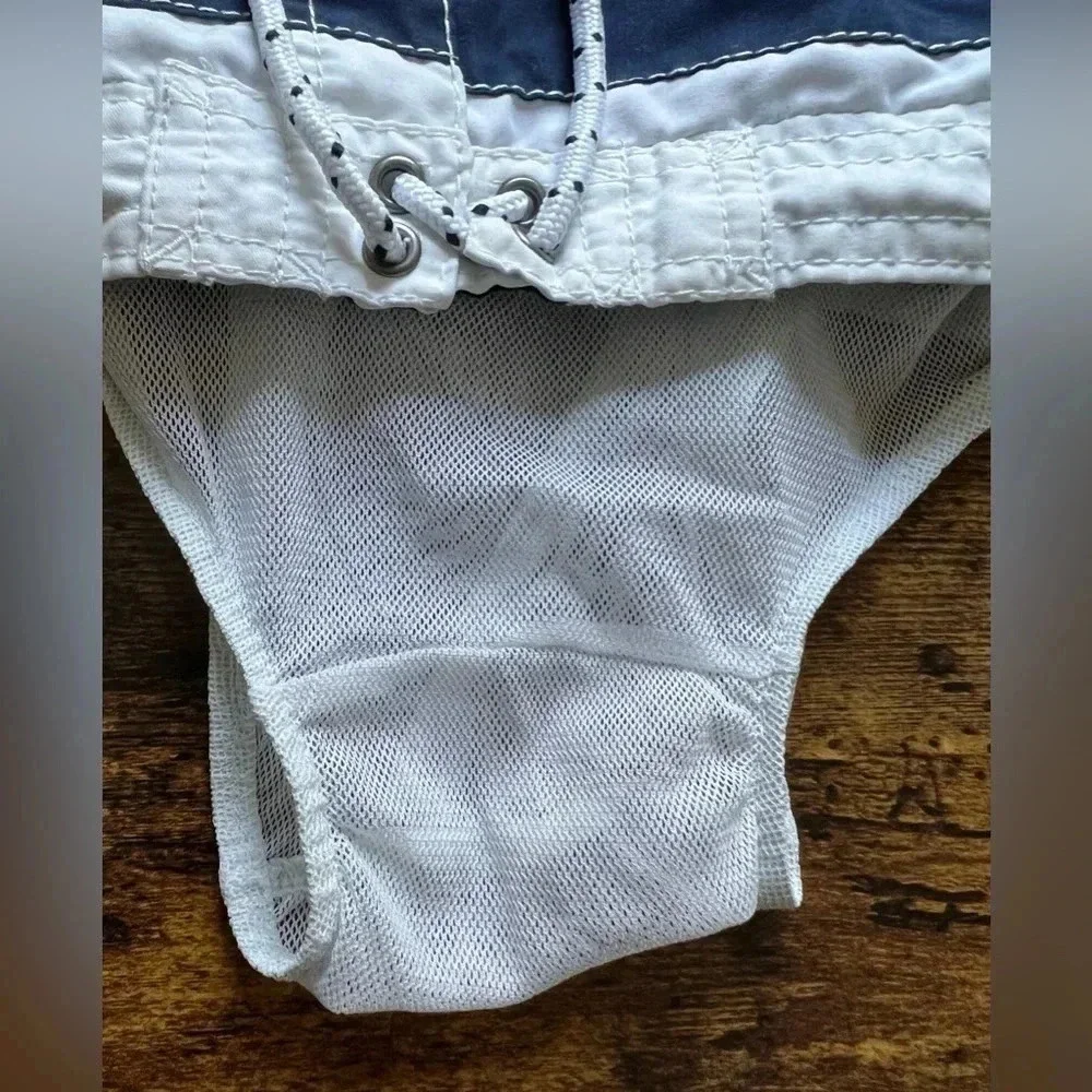 SET: Baby boy, Carter’s swim trunks + jumping beans. Size: 12M​